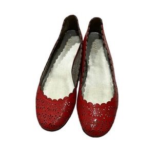 Red coach ballet flats